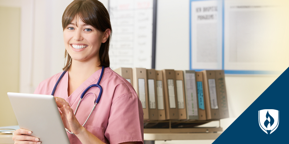 female nurse with tablet in records office