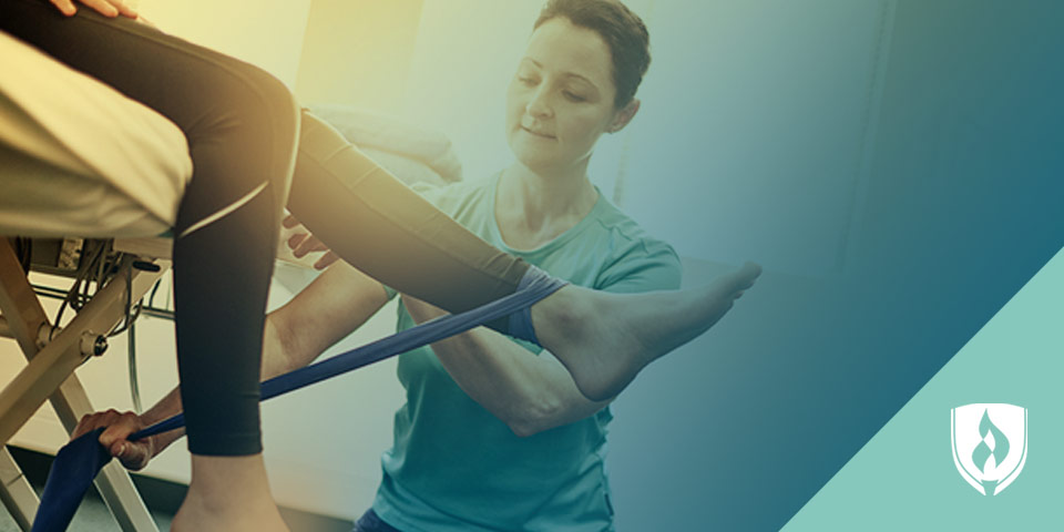 female physical therapist helping patient with rehab