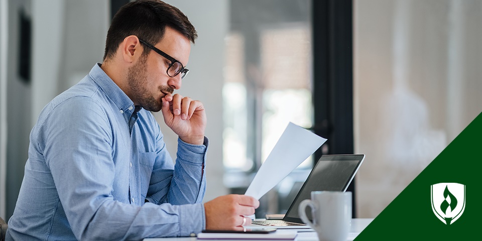 photo of paralegal working at a desk representing is earning a paralegal certificate worth it