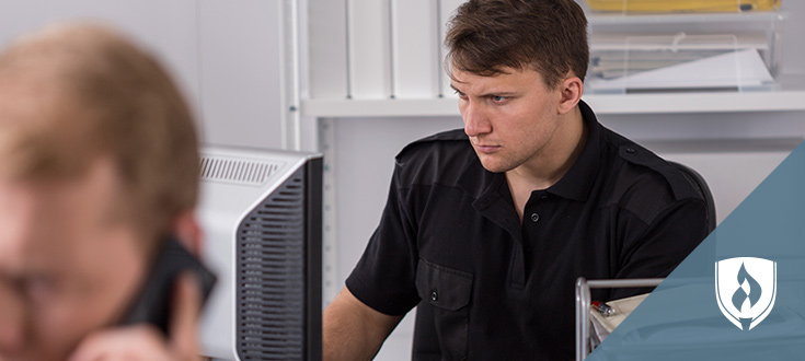 male working in front of computer