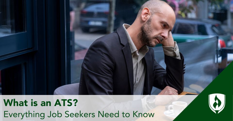 A job seeker sits at a computer trying to enter information into the ATS