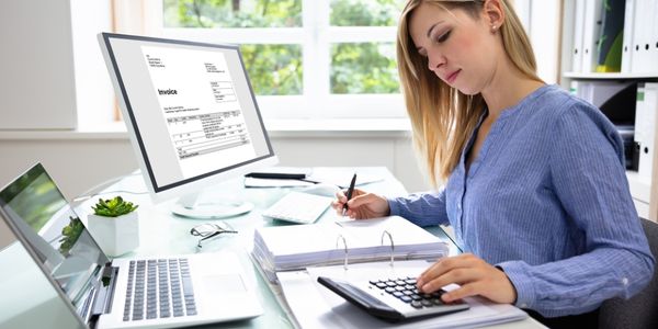 accountant using a calculator