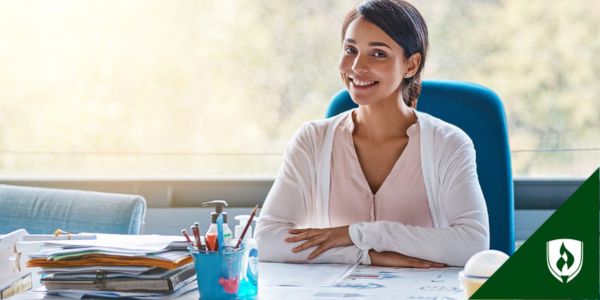 An ECE director sits at a bright and colorful desk