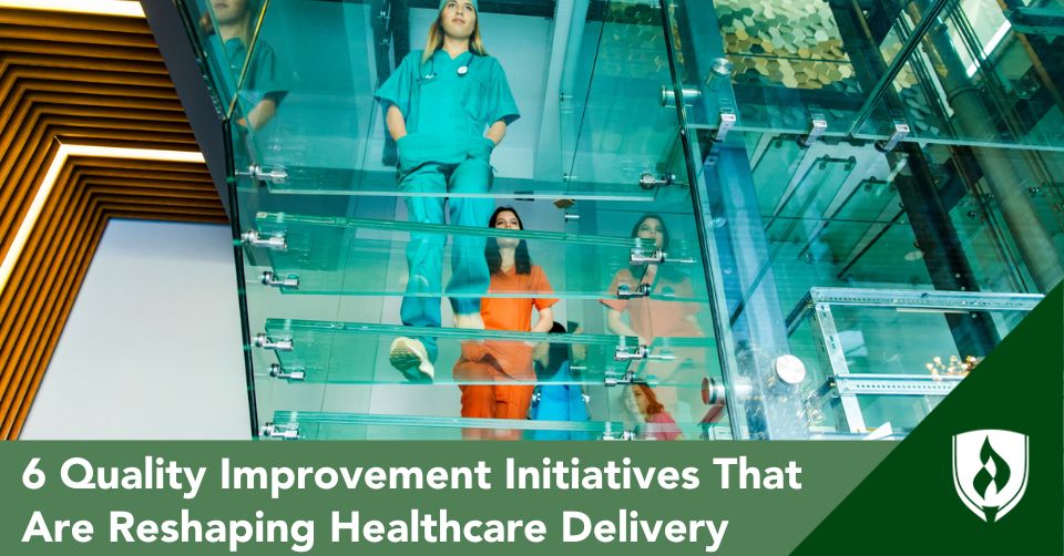 A modern, glass hospital stairway reveals different professionals in healthcare