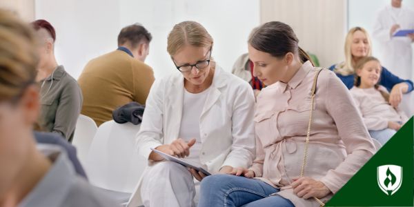 Going over paperwork in a clinic waiting room