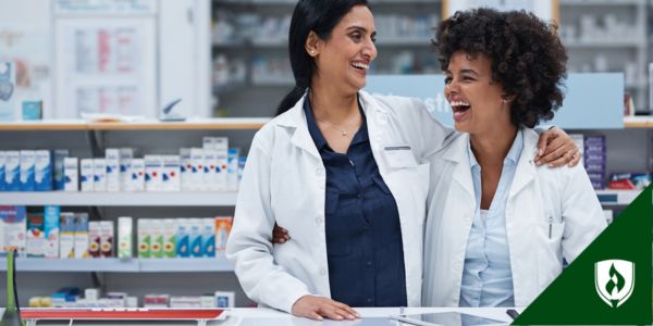 A Pharmacist and pharm tech laugh on the job