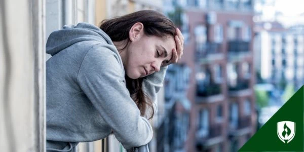 A woman in crisis looking devastated