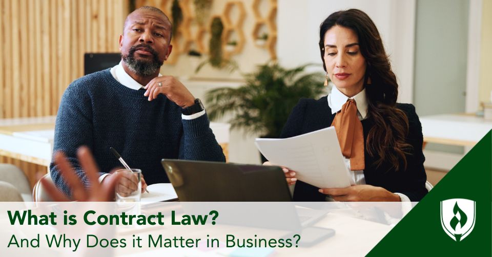 Two corporate lawyers meet with a stakeholder