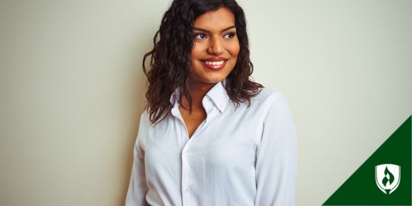A legal assistant smiles looking off to the side of the frame