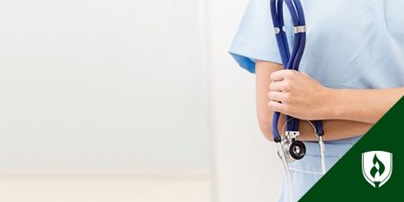 LPN with arms folded holding stethoscope