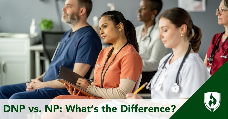 Three nurses sit in a conference.