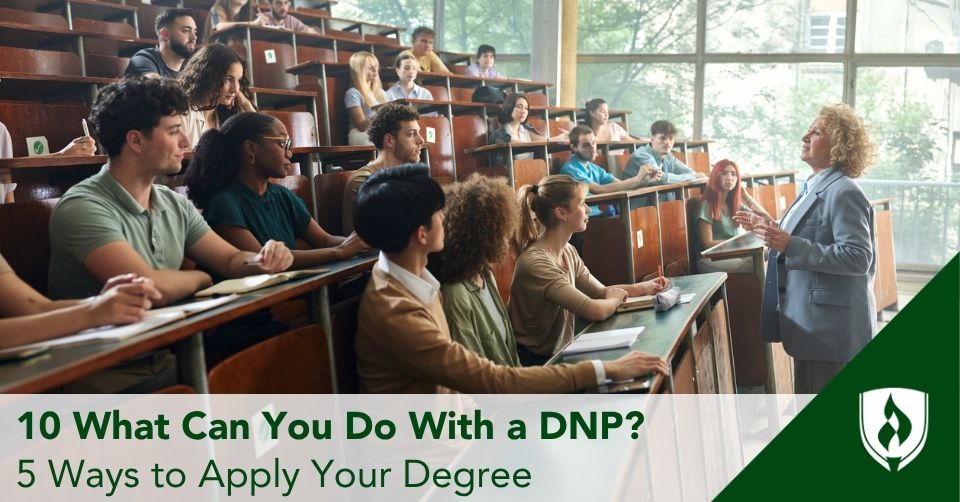 A DNP nurse stands in front of a lecture hall